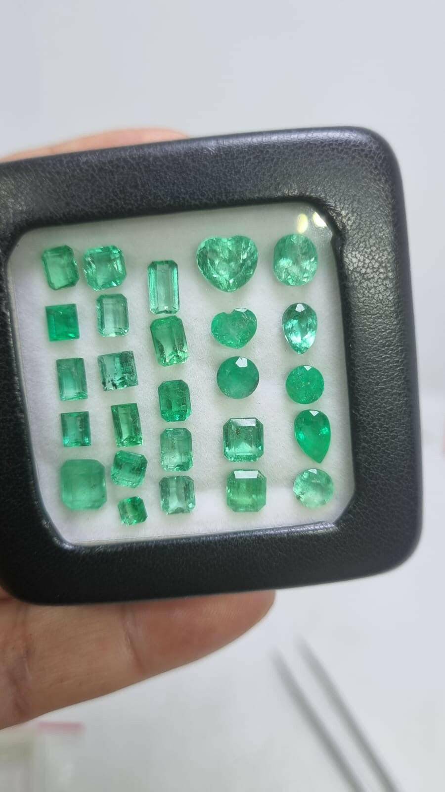 14.3ct lot of muzo colombian emeralds, multi cut