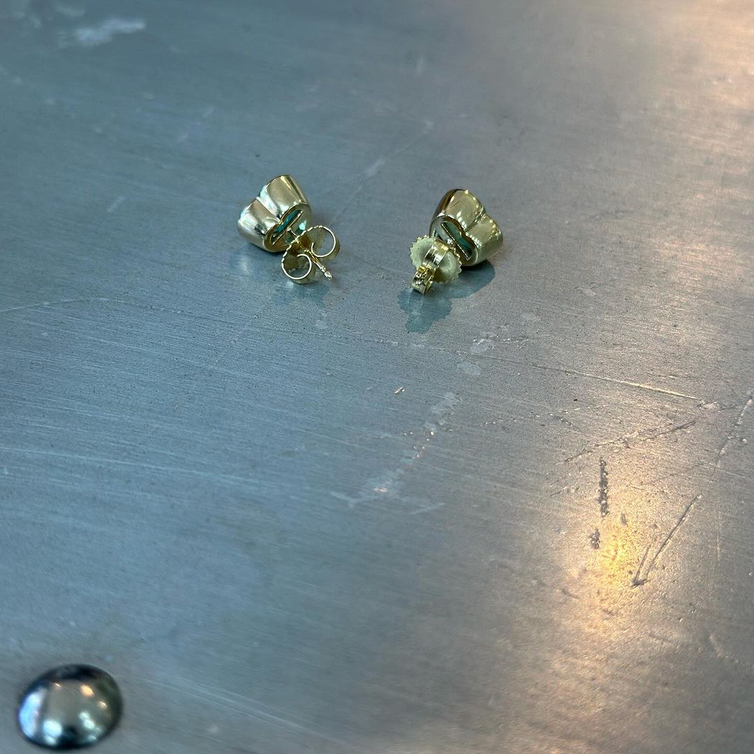 2.84tcw pair of Muzo emerald studs from behind.