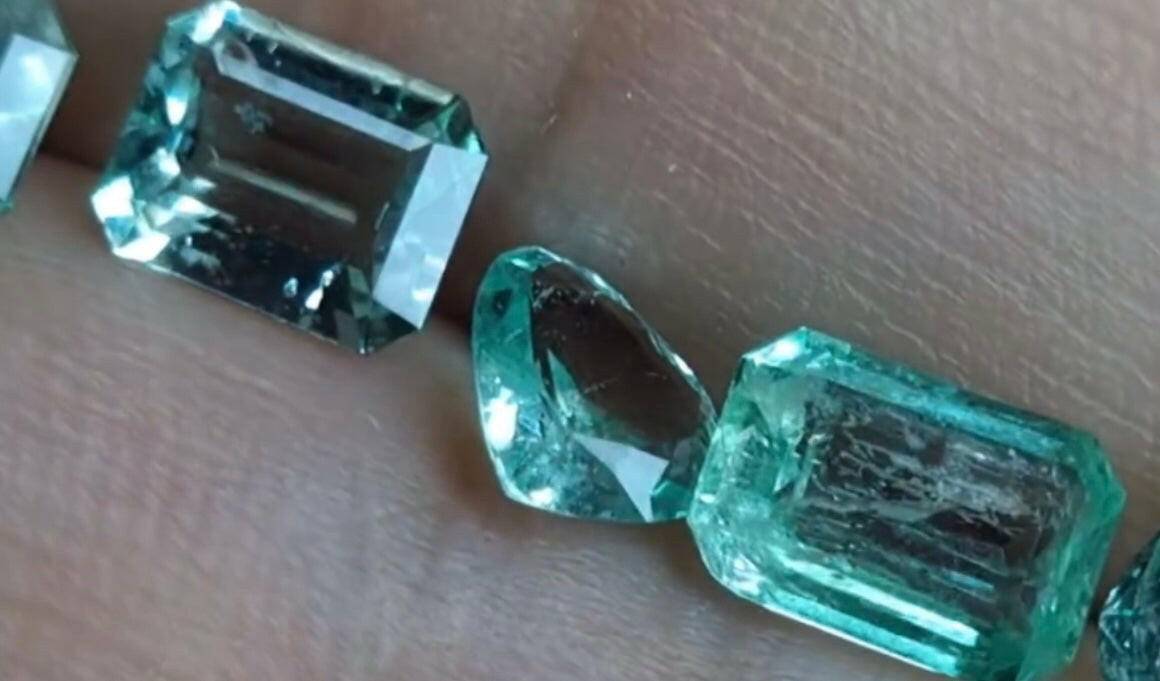 Mixed cut Colombian untreated emeralds superb clarity 4 carat lot up close