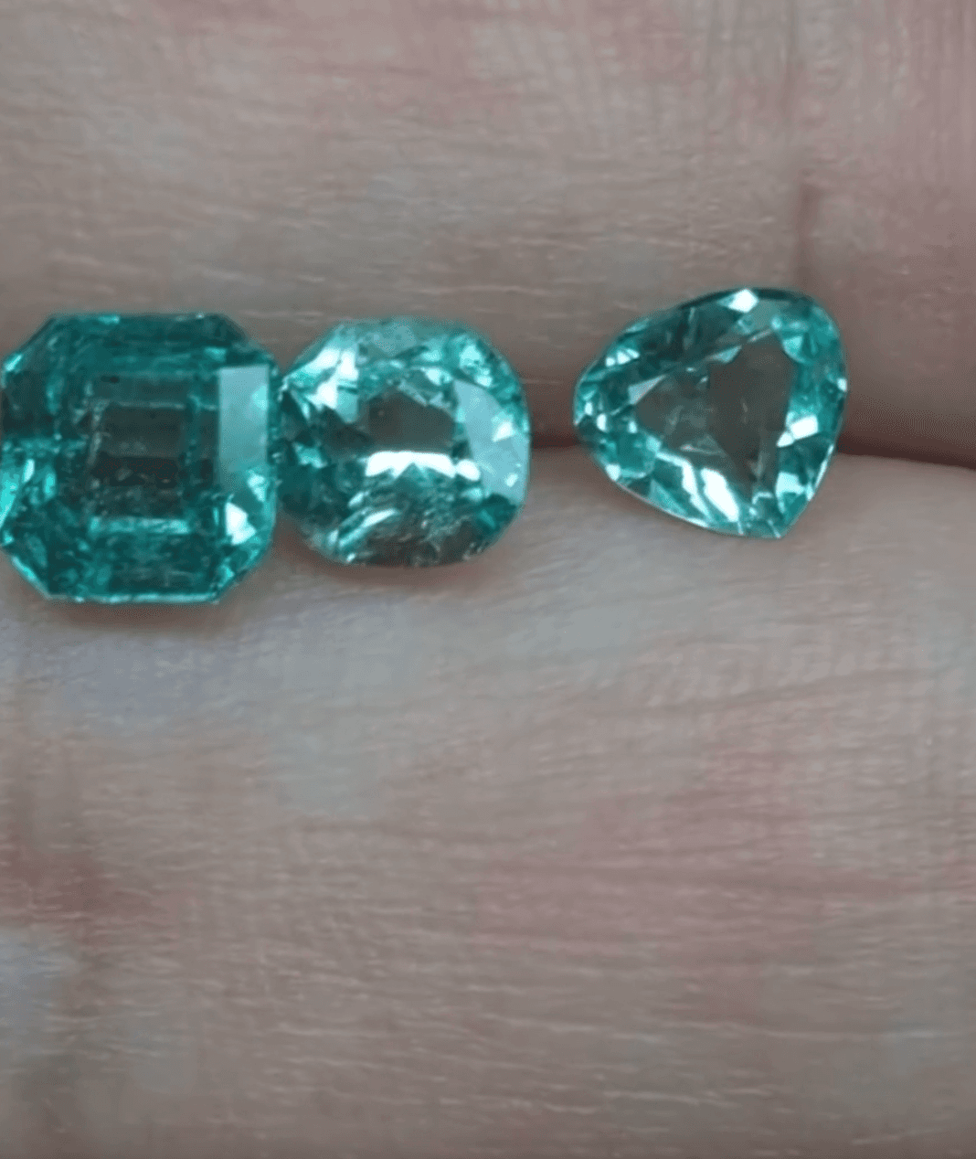 2.35 carat triplet lot Colombian emeralds shining brightly