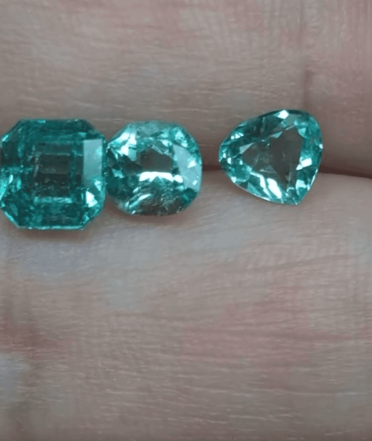 2.35 carat triplet lot Colombian emeralds shining brightly