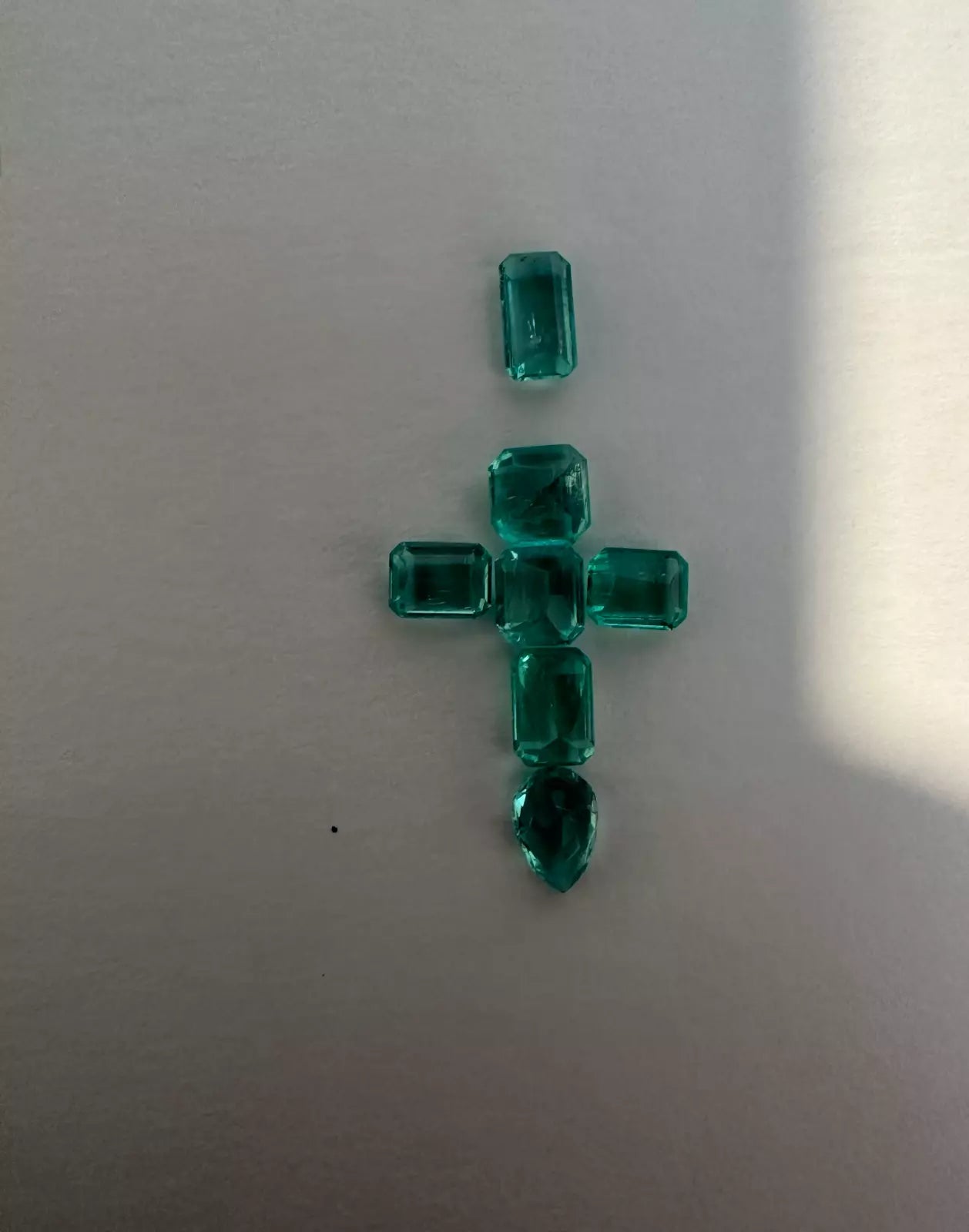 Muzo emerald cross 1.3" layout.