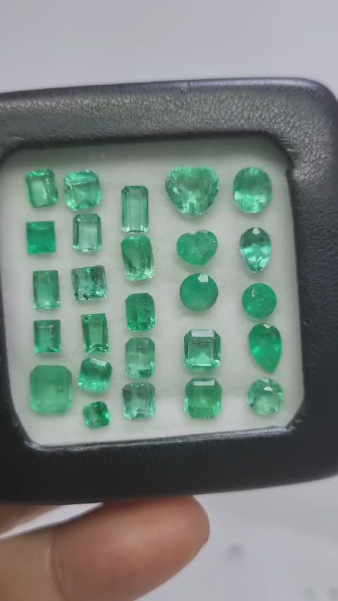 colombian emeralds from muzo 14.3 carat lot, stunning close up video